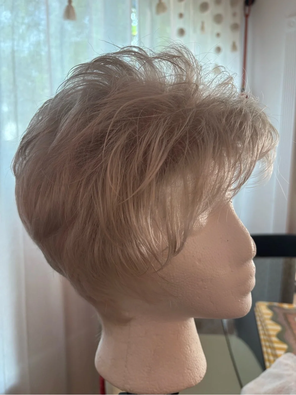 Raquel Welch pixie from